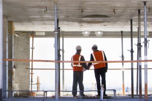 Construction workers standing together on construction site
